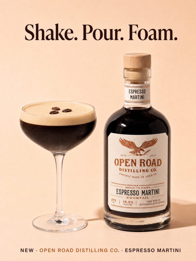 Ready-to-drink espresso martini in a coupe with creamy foam and espresso bean garnish next to the Open Road Distilling Co. bottle